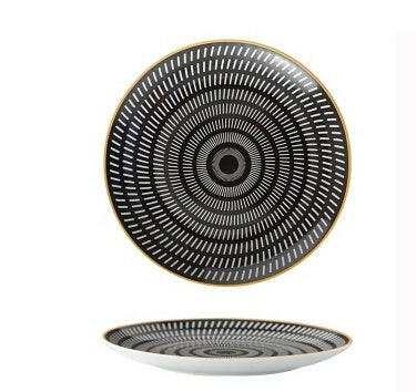 Geometric Series Ceramic Dishes in black and white with intricate circular pattern.