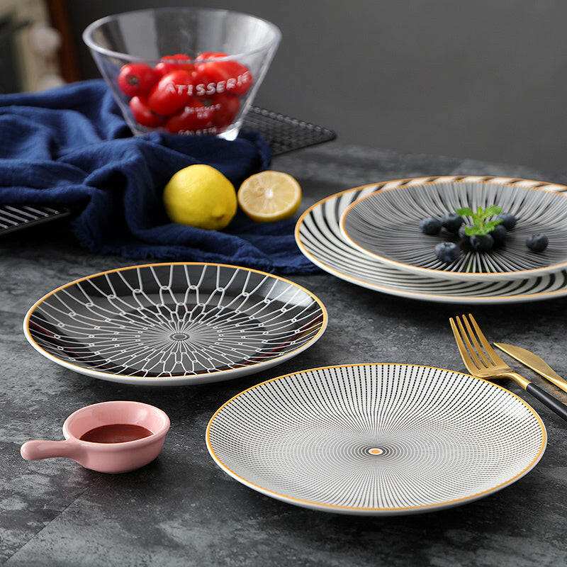 Modern geometric series ceramic dishes with intricate patterns in various shapes, featuring high-quality ceramic for durability and heat retention.