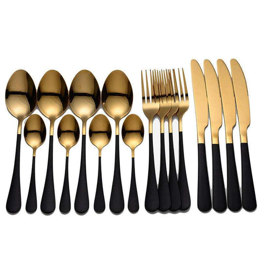 Gold and black everyday cutlery set with knives, forks, and spoons.