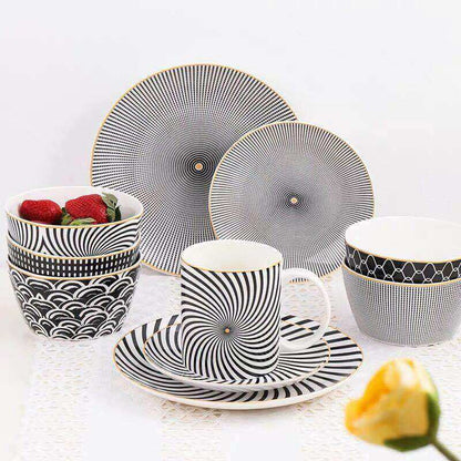 Geometric series ceramic dishes featuring modern black and white patterns with geometric designs.