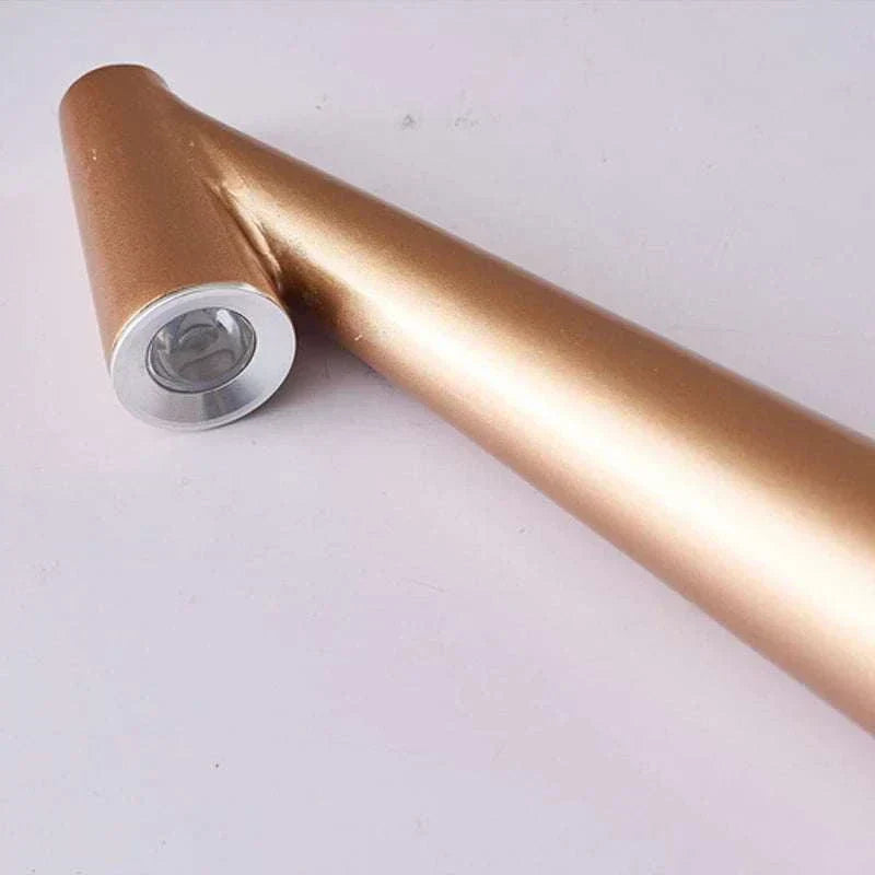 Portable LED Light with touch sensor and sleek gold conical design.