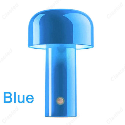 Blue rechargeable portable table lamp with minimalist modern design.