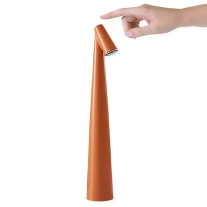 Portable LED Light with touch sensor, sleek conical design, orange color, minimalist, rechargeable and portable table  LED lighting.