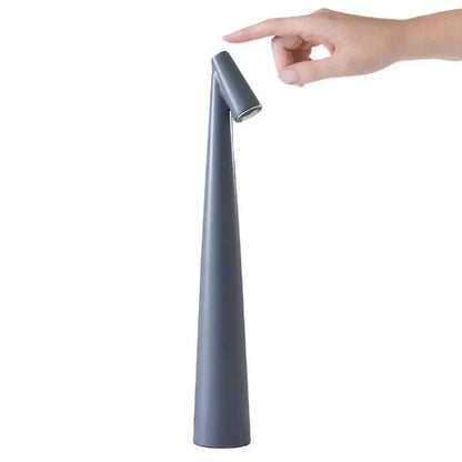 Portable LED Light with touch sensor, sleek conical design, grey color, minimalist, rechargeable and portable table  LED lighting.