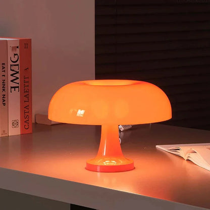 Orange Mushroom Table Lamp with dome design on a table adding modern elegance to decor.