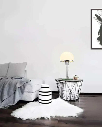 Bauhaus Table Lamp on modern side table in stylish living room.