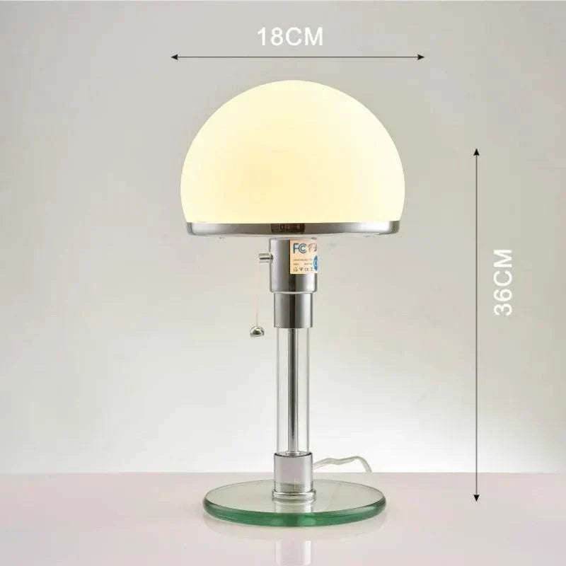 Bauhaus Table Lamp with dome-shaped shade on sleek metal stand and glass-like base.