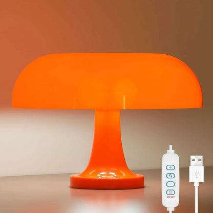 Orange mushroom table lamp with shiny, dome-like design and USB control, adds modern elegance and warm lighting to any space.