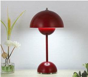 FlowerPot Lamp by Verner Panton in red, featuring iconic Scandinavian design and interlocking dome construction.