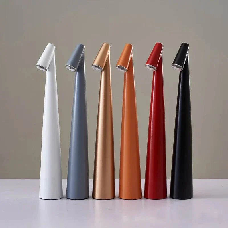 Portable LED Lamp with conical bases in white, gray, gold, orange, red, and black.