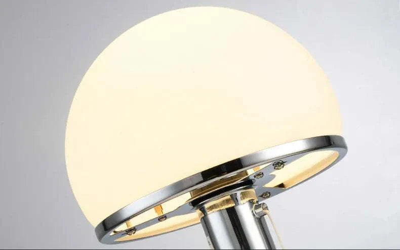 Bauhaus Table Lamp with dome-shaped shade and sleek metal stand.