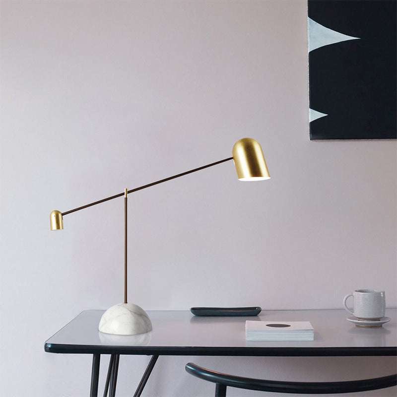 Marble Table Lamp with gold dome and white marble base on desk.