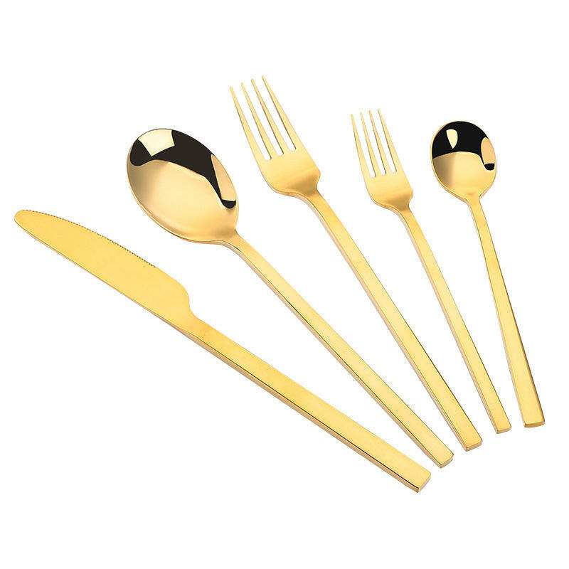 Gold matte stainless steel cutlery set with modern design, including knife, fork, and spoon.