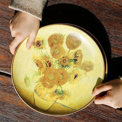 Vincent van Gogh Sunflowers oil painting ceramic plate on a wooden surface.