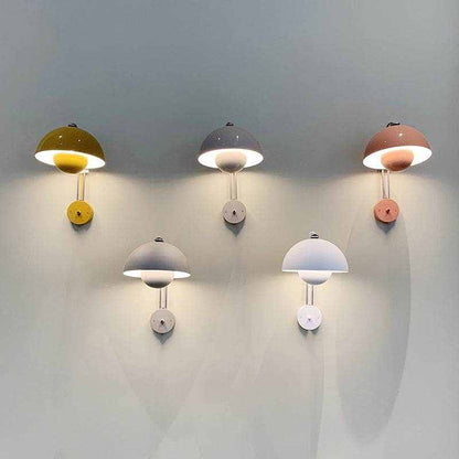 Modern Flowerpot Lamp wall lamps with dome-shaped shades, offering a warm, intimate glow, mounted on a wall.