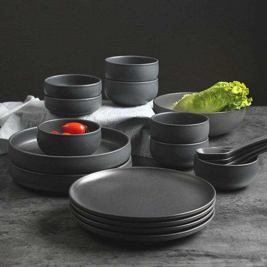 Modern black dining set with bowls.