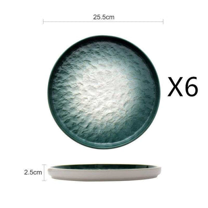 Emerald gradient ceramic plate set with glossy finish and modern design.